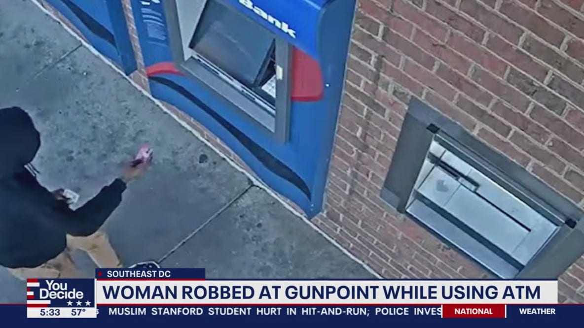Woman withdrawing money from ATM robbed at gunpoint in DC: police